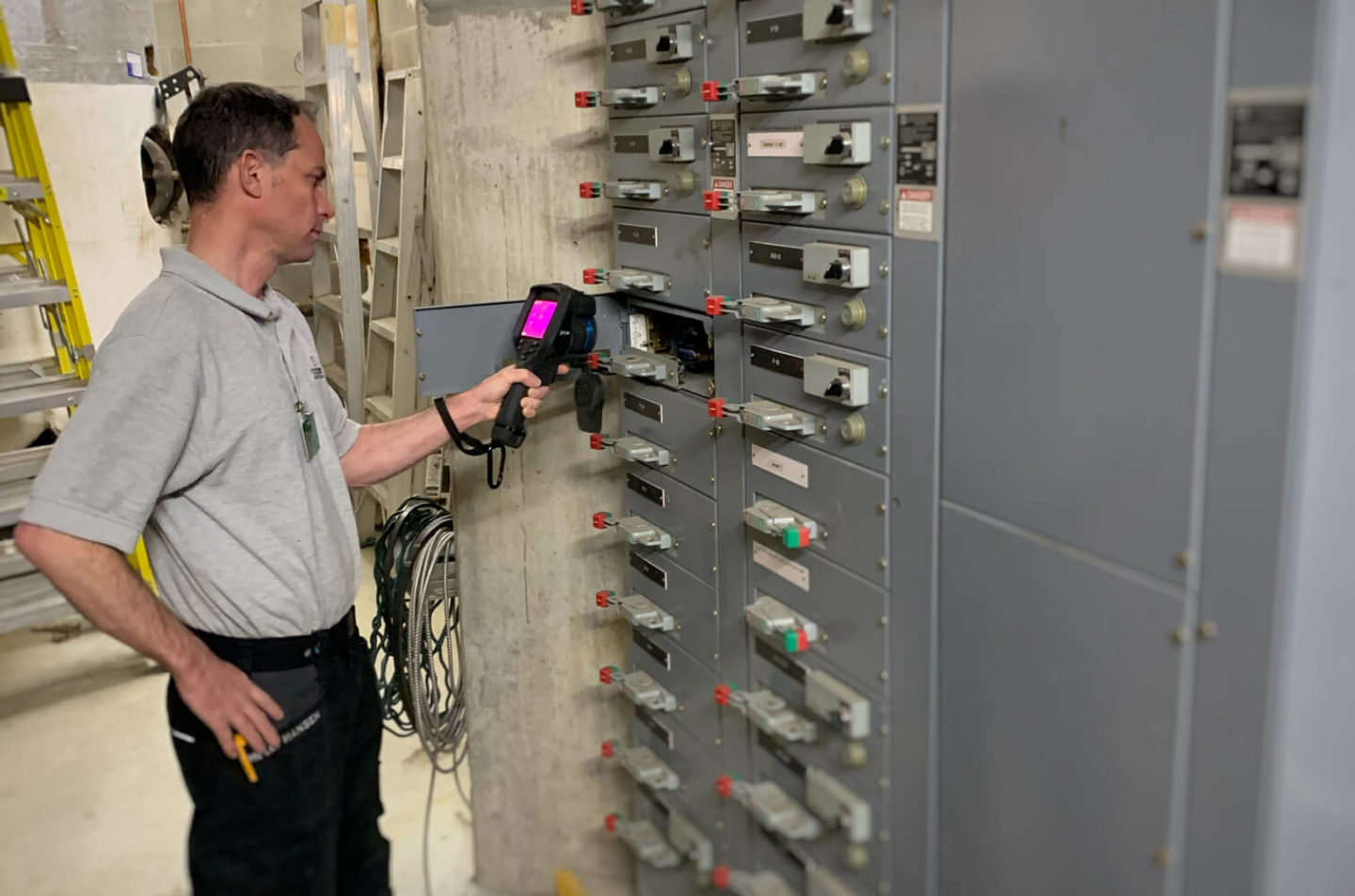 Electrical maintenance work in a commercial facility